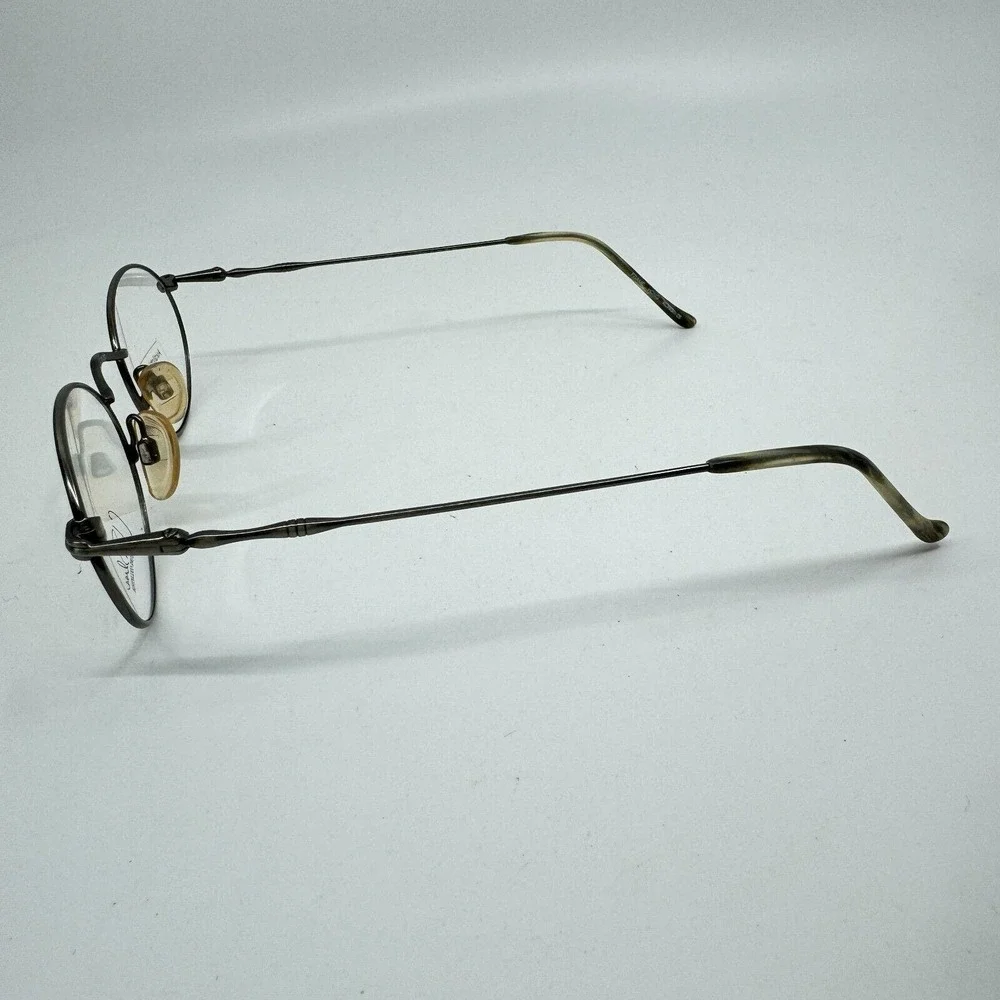 Kenmark Eyeglasses Frames Gallery‎ Silver Round Tortoise 49-20-140 H11133